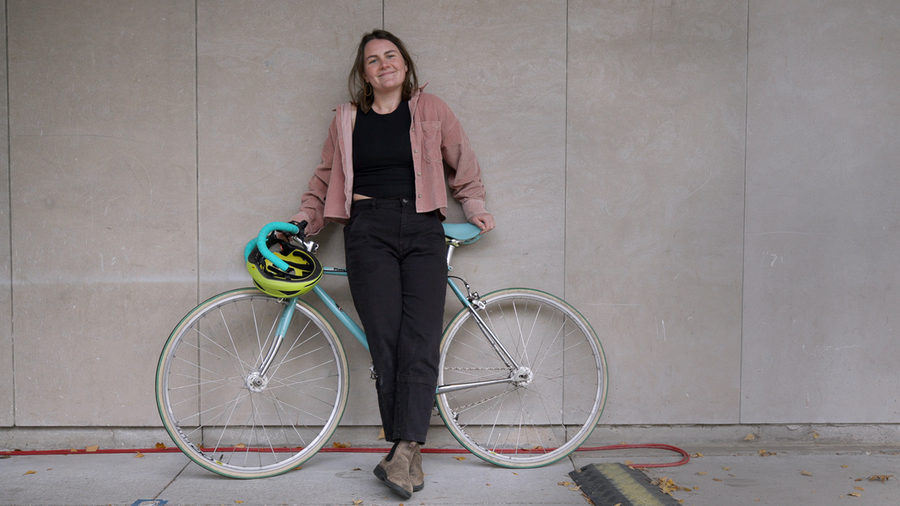 Graduate student Bianca Champenois with bike.