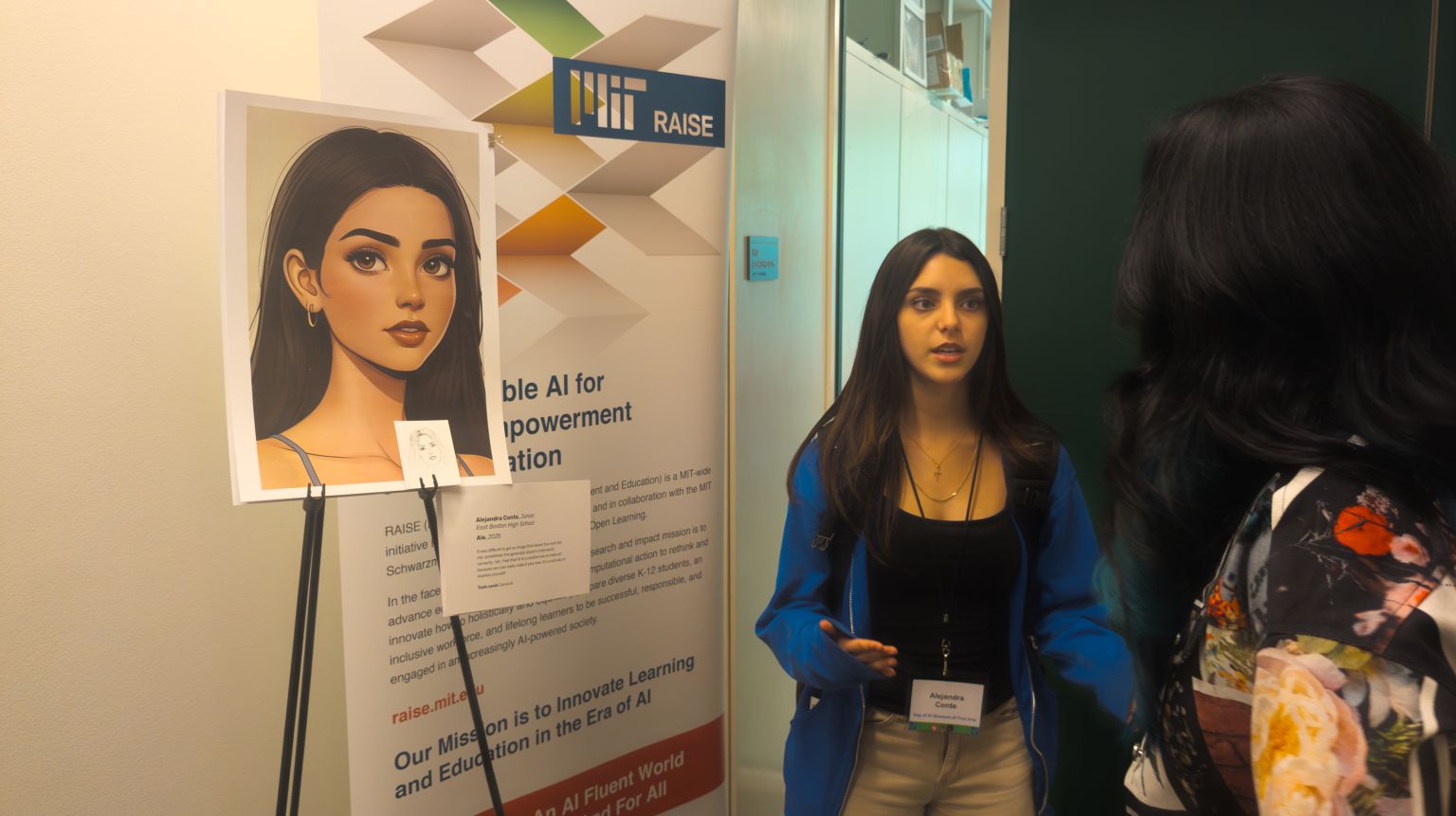A student displays her AI created art at Day of AI 2025