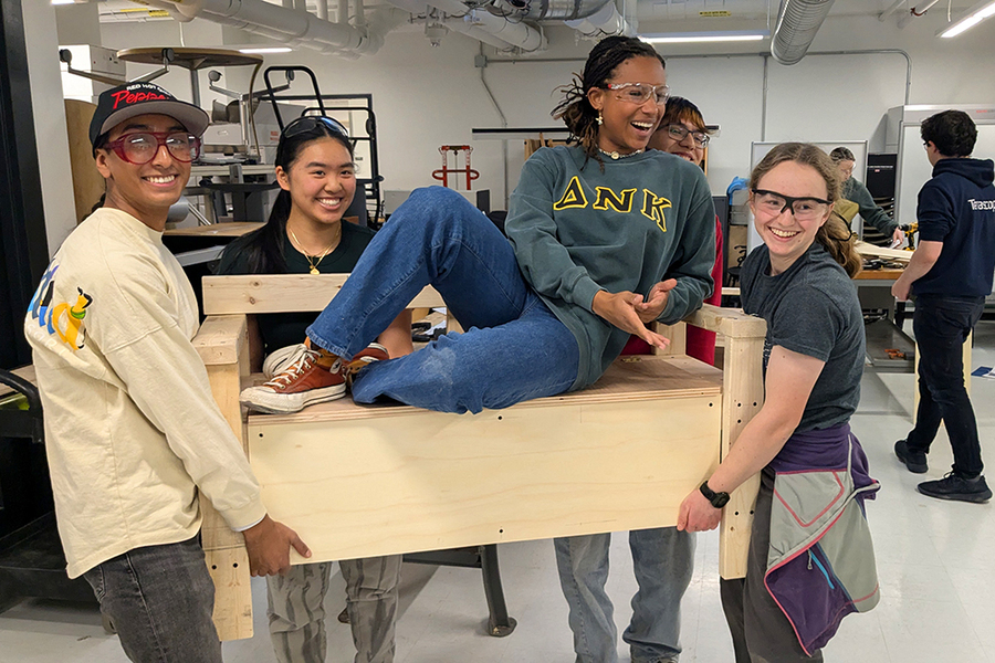Rachel Mohammed (center) helps Terrascopers (left to right) EJ Dominguez, Angela Lin, Sergio Long, and Lizzie Cable test one of their constructions.